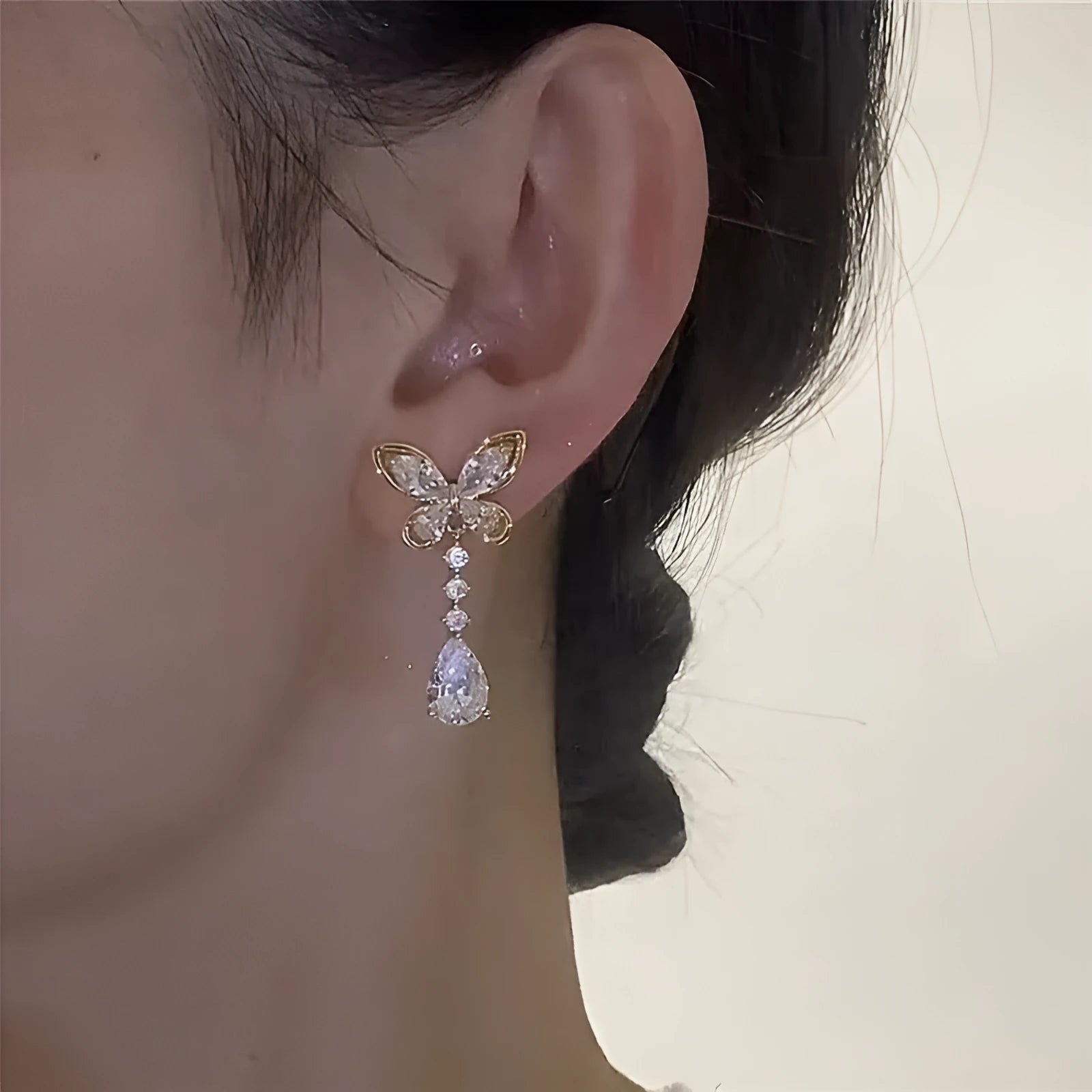 Women's bow stud earrings with electroplated platinum finish on zinc alloy