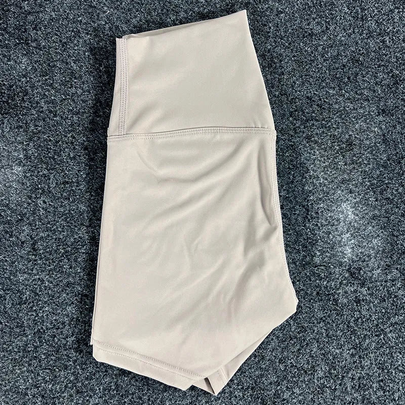 Ladies high-waist yoga shorts in moisture-wicking nylon fabric, shown in various colours