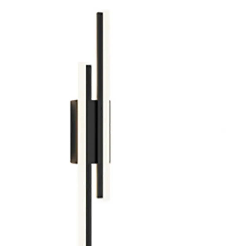 Scandinavian minimalist LED wall light with an acrylic shade on a black arm, mounted on a light-coloured wall.