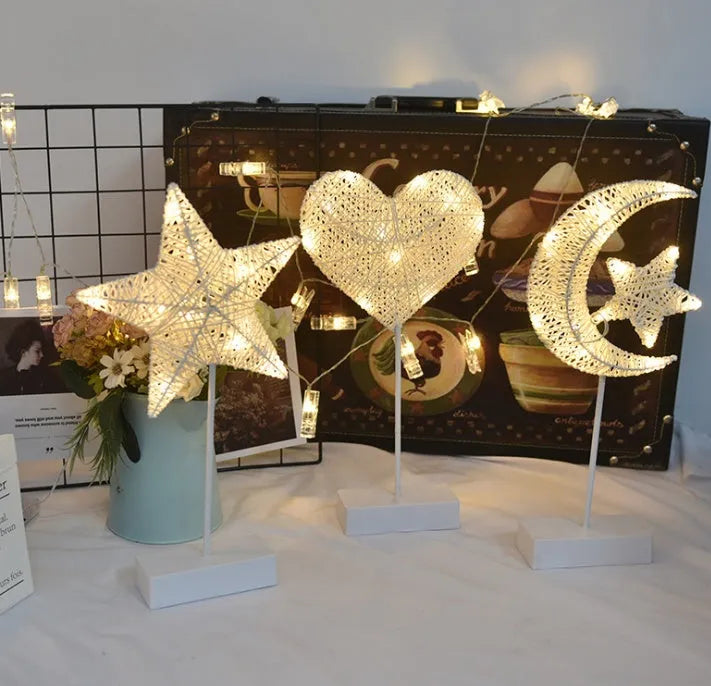 Rattan woven LED decorative table lamp in star, heart, or moon shape with copper wire frame and battery operation