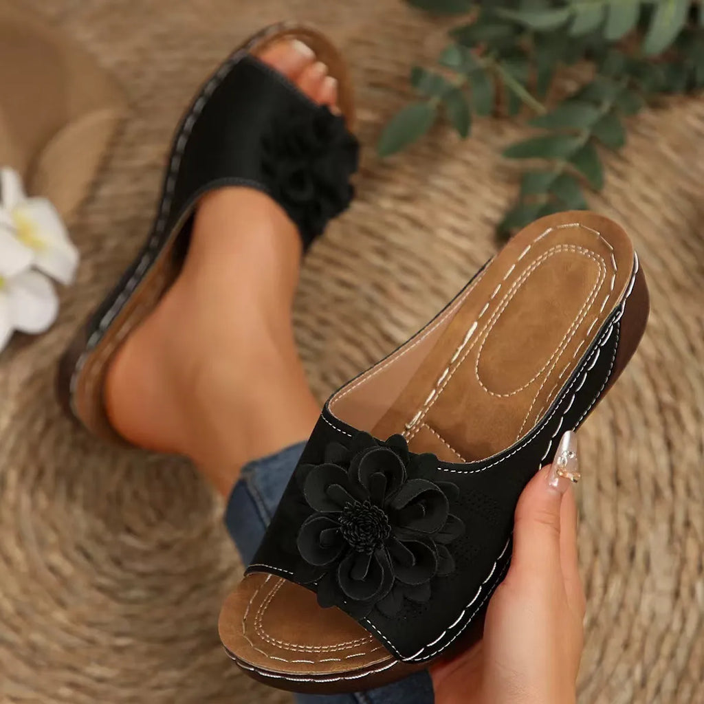 Women's black PVC peep-toe slippers with a thick rubber sole and fish mouth design.