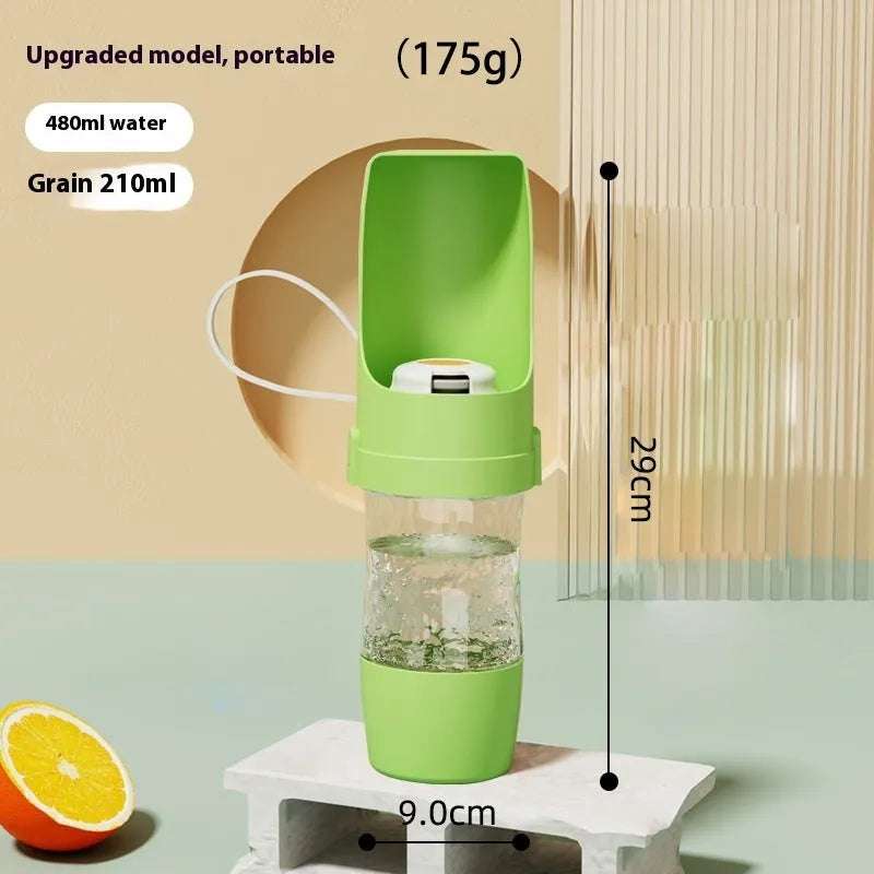 Green 2-in-1 travel dog water bottle and food container with attached lanyard, shown folded.