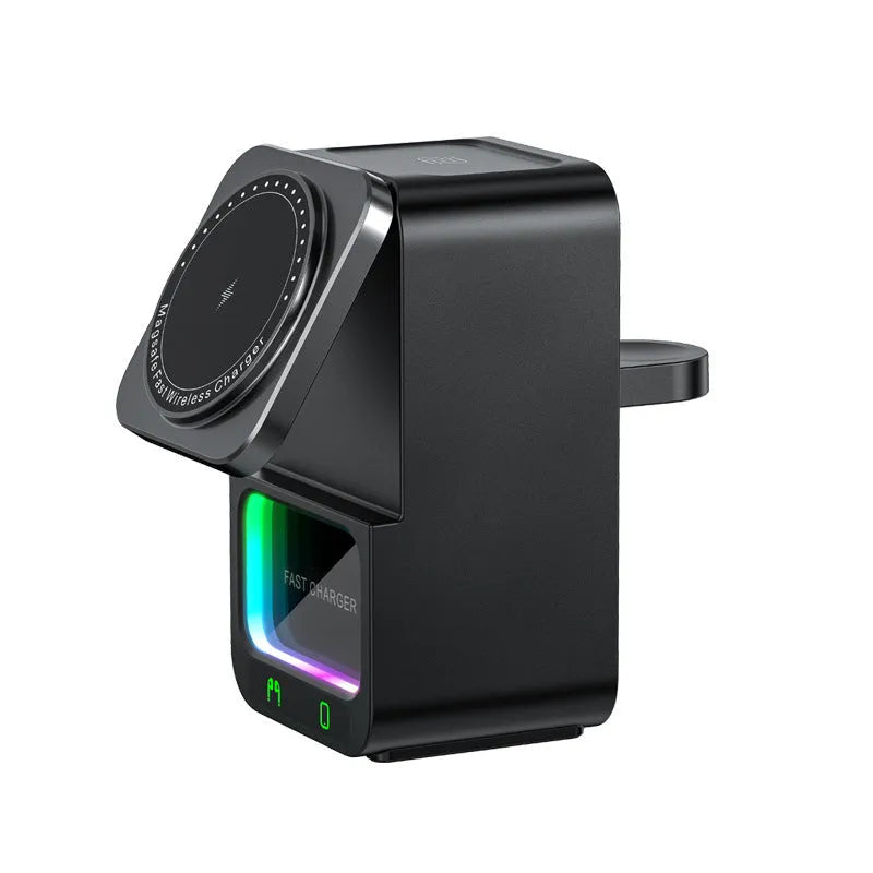 White and black 5-in-1 Bluetooth speaker wireless charger unit on a table