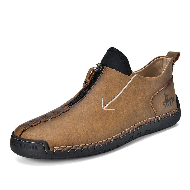 Men's black zip-up casual leather boots with round toe and hand-stitched rubber sole.