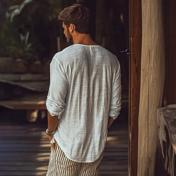 Beige V-neck long-sleeved slim fit t-shirt on a hanger showing front design