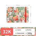 Feiluniao fabric cover watercolour notebook open on a table with brushes, 185mm length