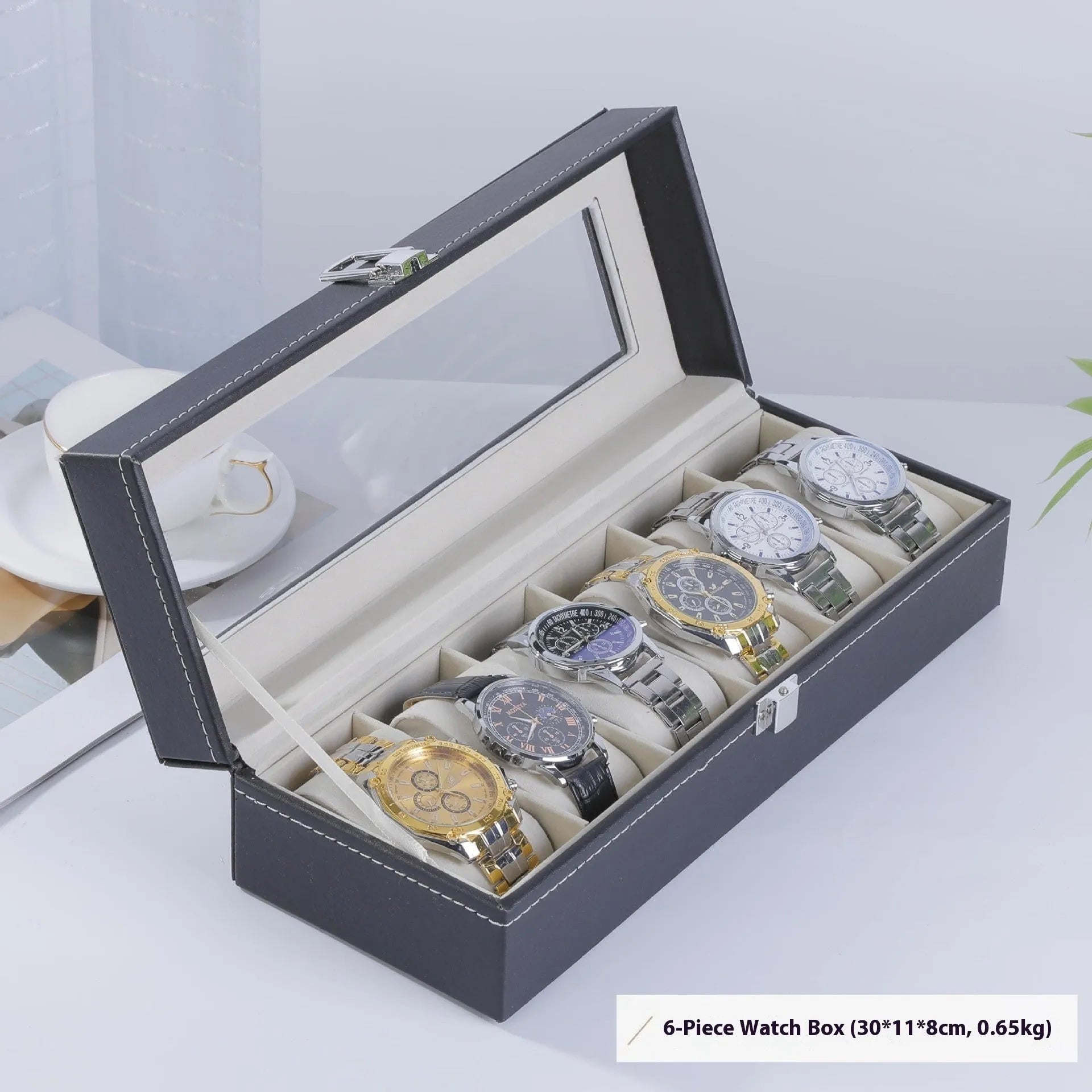 Grey high-grade leather watch storage box with transparent lid showing watch slots inside.