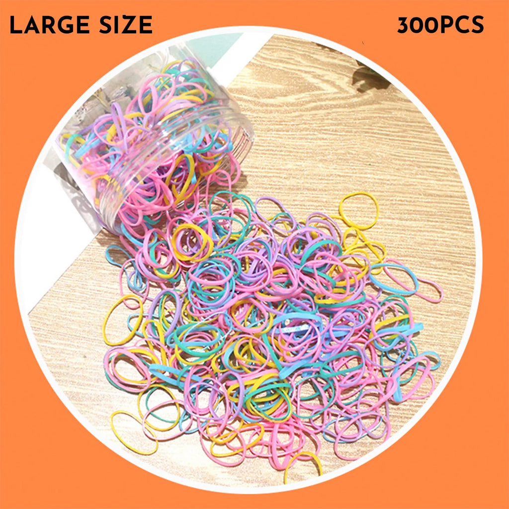 Pack of small, colourful TPU elastic hair bands for babies and toddlers in a reusable container.