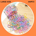 Pack of small, colourful TPU elastic hair bands for babies and toddlers in a reusable container.