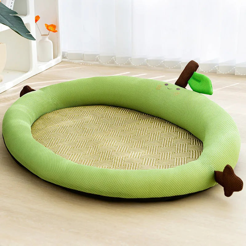 Green pet cooling mat and nest bed with fruit-shaped backrest for dogs or cats.