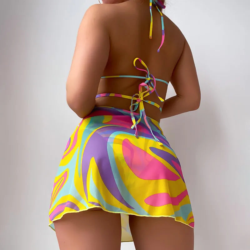 Yellow striped halter neck swimsuit set with lace-up front, skirt, and shorts for women