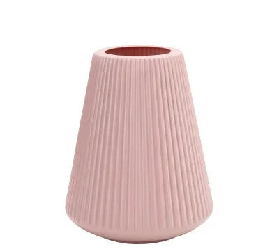 Melamine plastic decorative flower vase in four colours on desktop