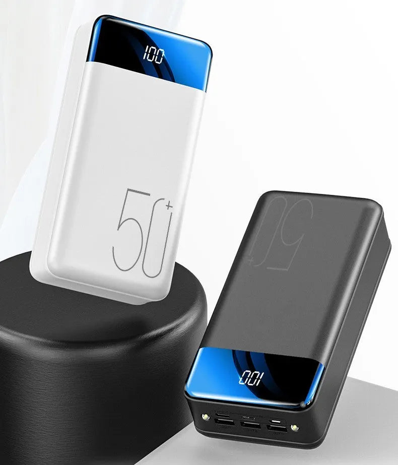 Large 50000 mAh capacity power bank with three USB ports showing black or white colour options