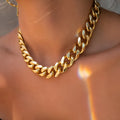Gold women's thick chain necklace with 6cm pendant on 32cm chain, electroplated alloy construction