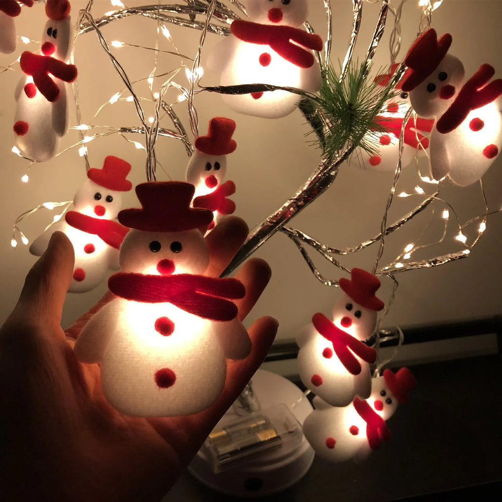 Snowman LED Christmas string lights garland with warm white LEDs on green wire