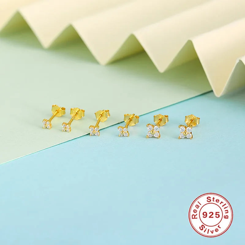 S925 sterling silver stud earrings with geometric petal crystal flower design in gold or platinum finish.