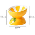 Ceramic elevated cat bowl in orange, pitaya, or watermelon pattern with a tilted, wide design.