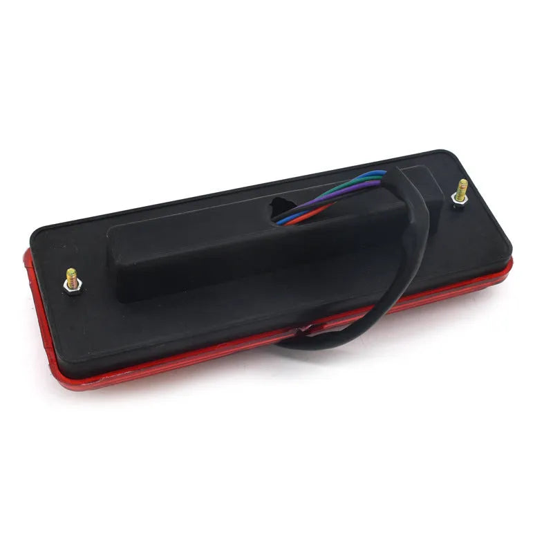 Black electric tricycle taillight with integrated shell design measuring 200mm by 70mm