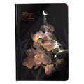 A5 notebook with luminous cover open to show colour illustrated pages, available in four colours.
