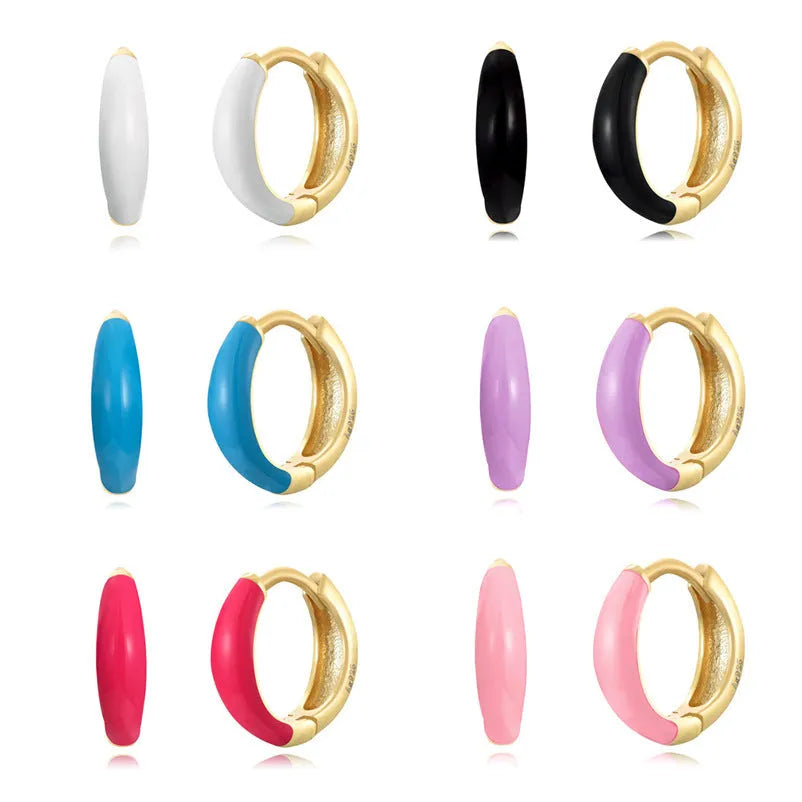 Curved geometric epoxy oval earrings in coloured finish on silver-tone copper post