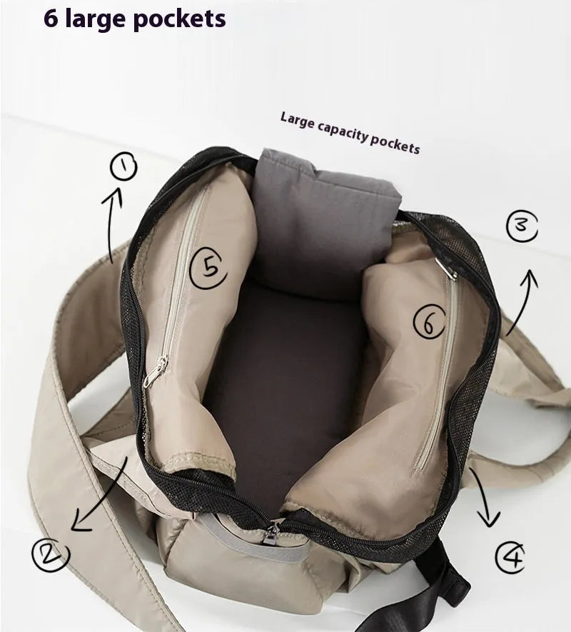 Apricot coloured cloth pet carrier handbag for small dogs and cats, shown with dimensions 41cm by 16cm by 28cm.