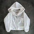 Unisex baggy coat in solid black or white polyester with cardigan style and long sleeves