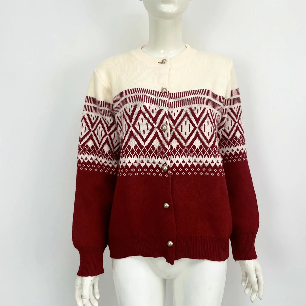 Women's grey alpaca wool cardigan with long sleeves and a diamond knit pattern in contrasting colours.