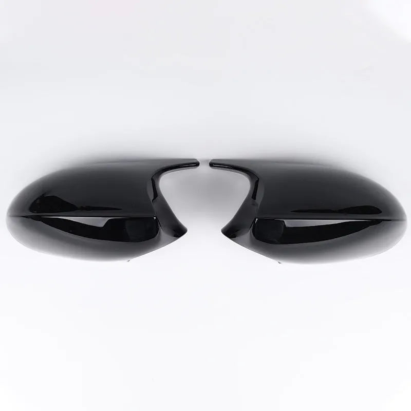 Pair of black ABS plastic rearview mirror housing shells for BMW 3 Series E90.