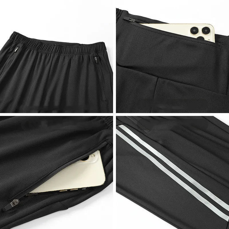 Men's black and navy blue running trousers with mid waist design and polyester fabric
