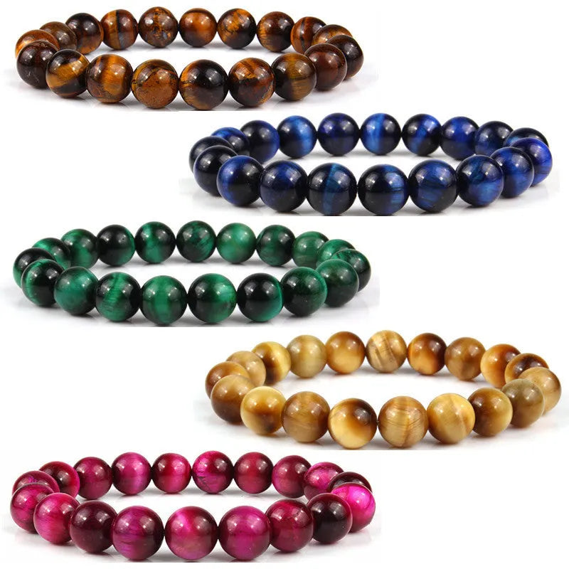 Natural tigereye crystal bracelet with round geometric beads on a wrist