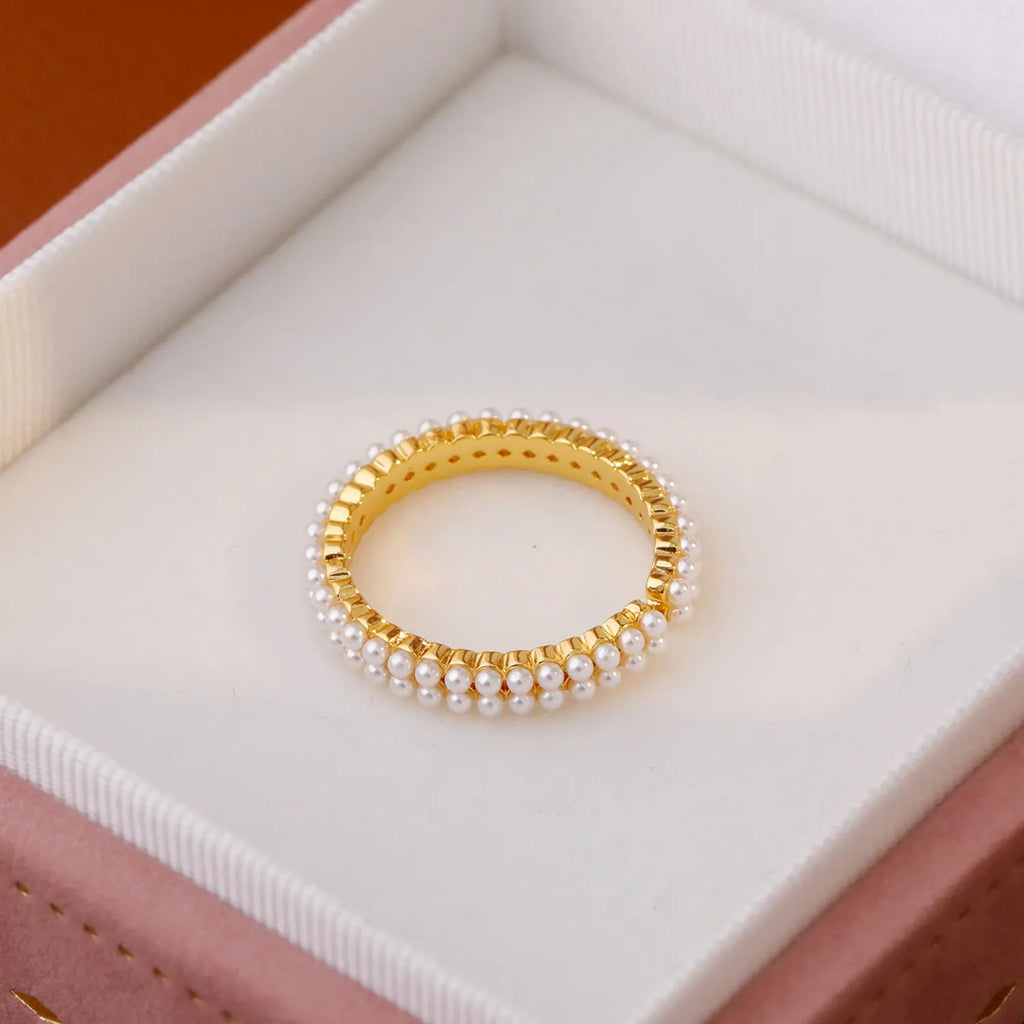 Gold geometric open mouth women's ring with central pearl on copper with electroplated finish