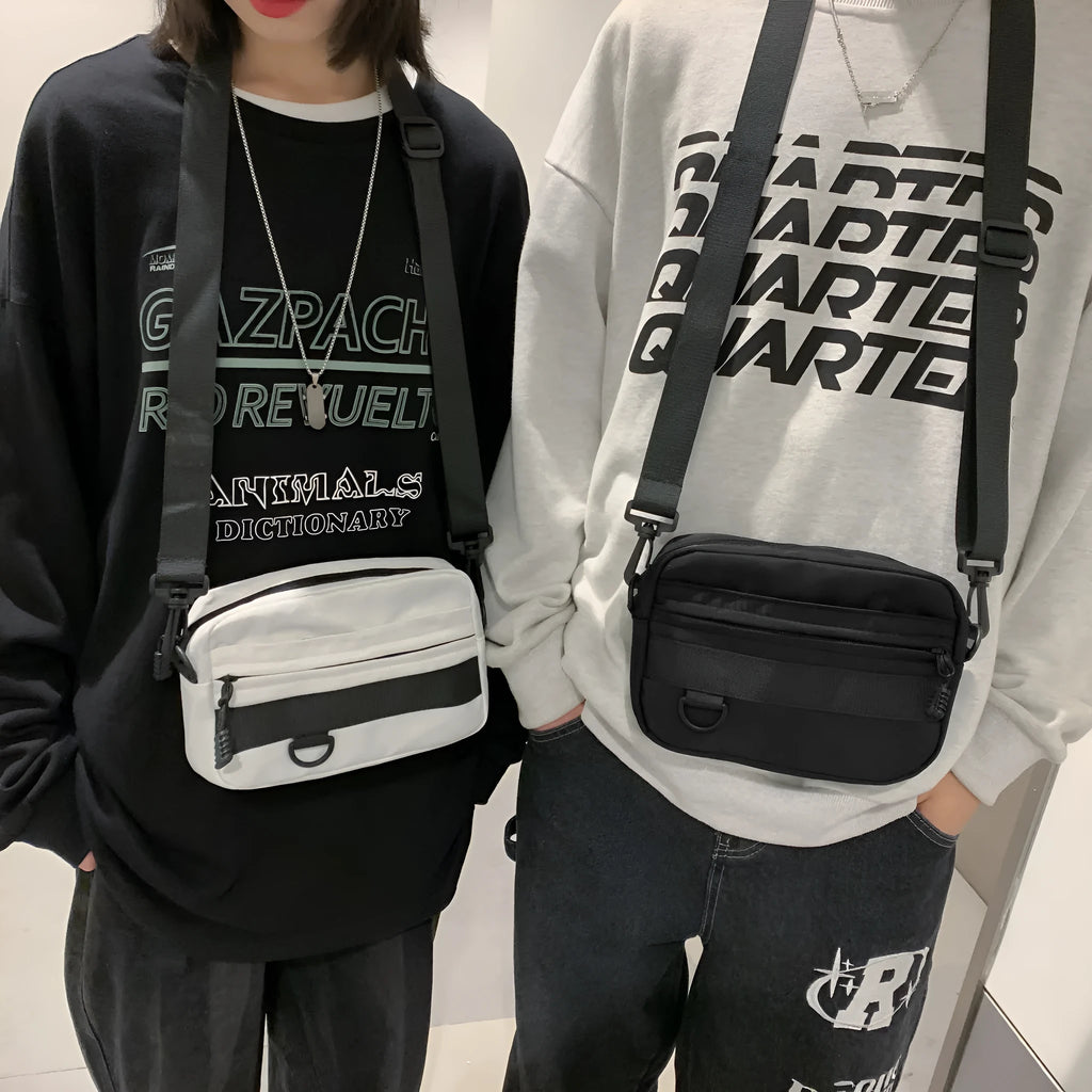 Men's nylon messenger bag in black, blue, green, or white with crossbody strap and street style design