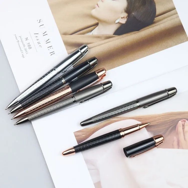 Gun grey metal rollerball pen with 13.5cm barrel shown alongside black and blue refills
