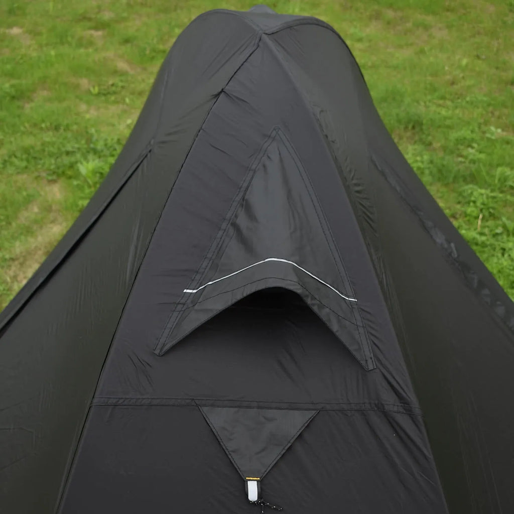 Single person hiking tent with aluminium poles pitched in outdoor setting showing red colour option