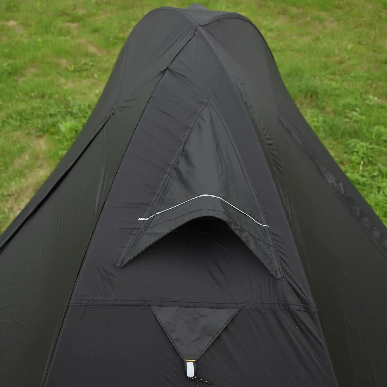 Single person hiking tent with aluminium poles pitched in outdoor setting showing red colour option