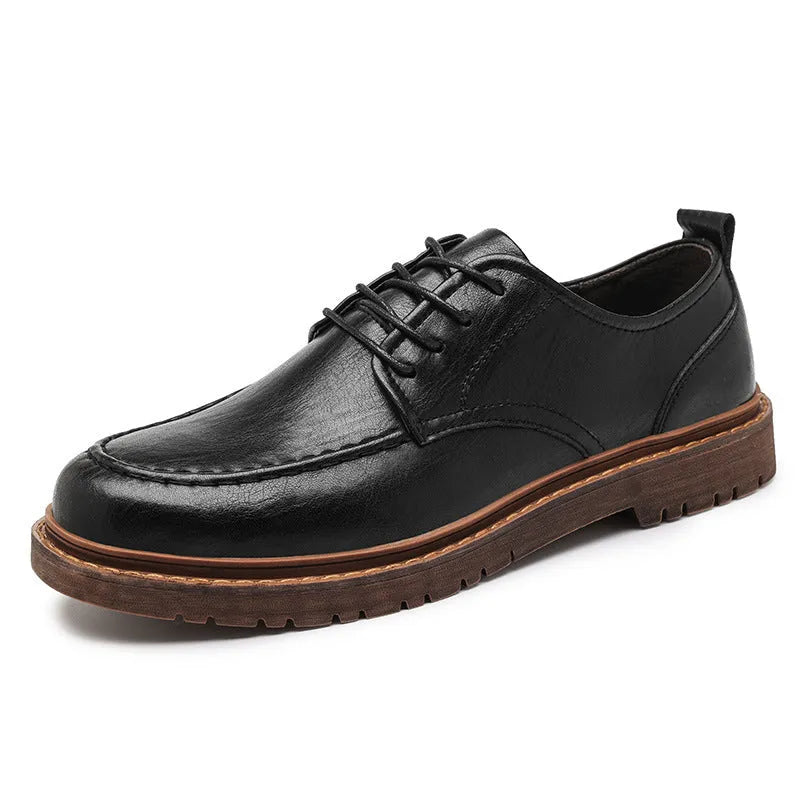 Men's black and brown casual leather shoes with a round toe and flat rubber sole.