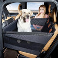 Grey rectangular cloth dog bed with raised sides measuring 56cm by 56cm.