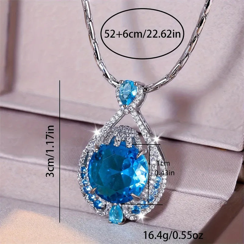Blue geometric pendant necklace with fireworks cut crystal on a water wave alloy chain for women