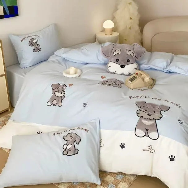 Cartoon Schnauzer design embroidered on a thickened cotton quilt cover and pillowcase from a complete bed linen set.