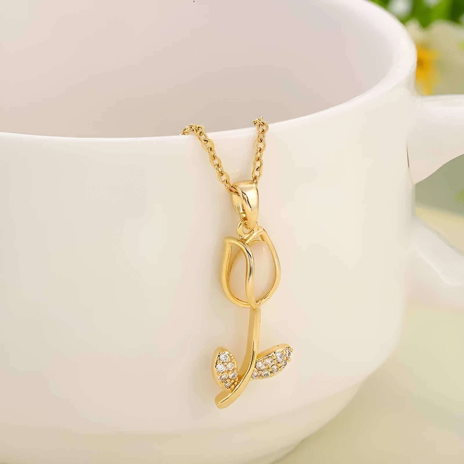 Zircon tulip necklace for women with gold flower pendant on adjustable titanium steel chain.