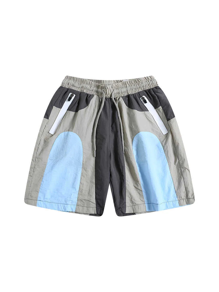 Blue loose-fit quick-drying beach shorts with elastic waistband shown flat