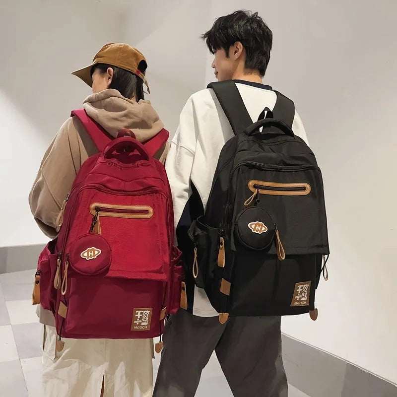 Large-capacity nylon school backpack for middle school students with curved shoulder straps in street trend style