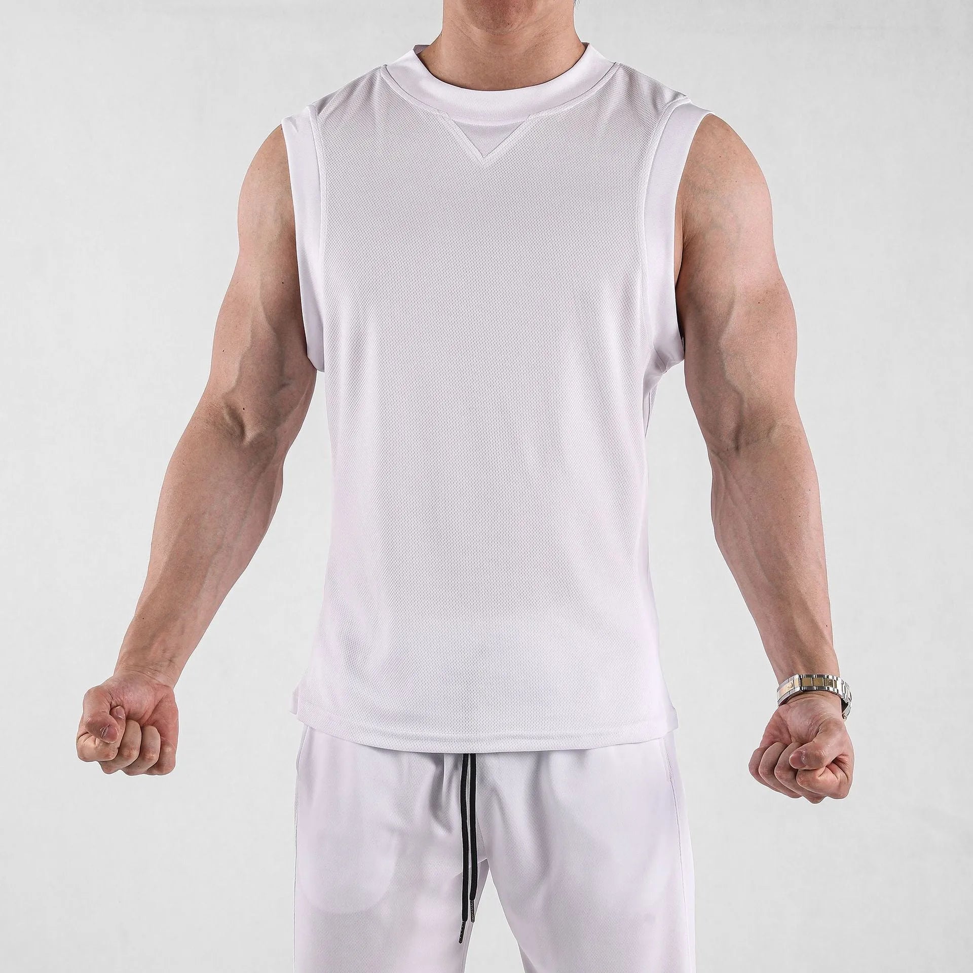 Men's black loose fit fitness vest made from soft quick-dry fabric for summer sports.