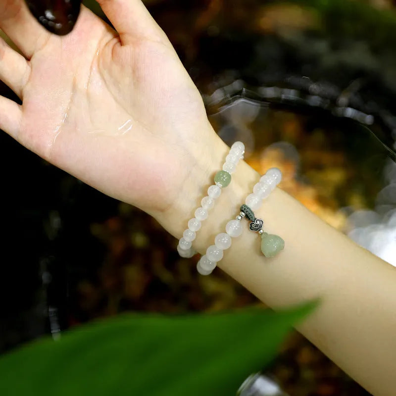 Women's bracelet with S925 silver clasp, white agate and Hetian jade beads in geometric lotus design