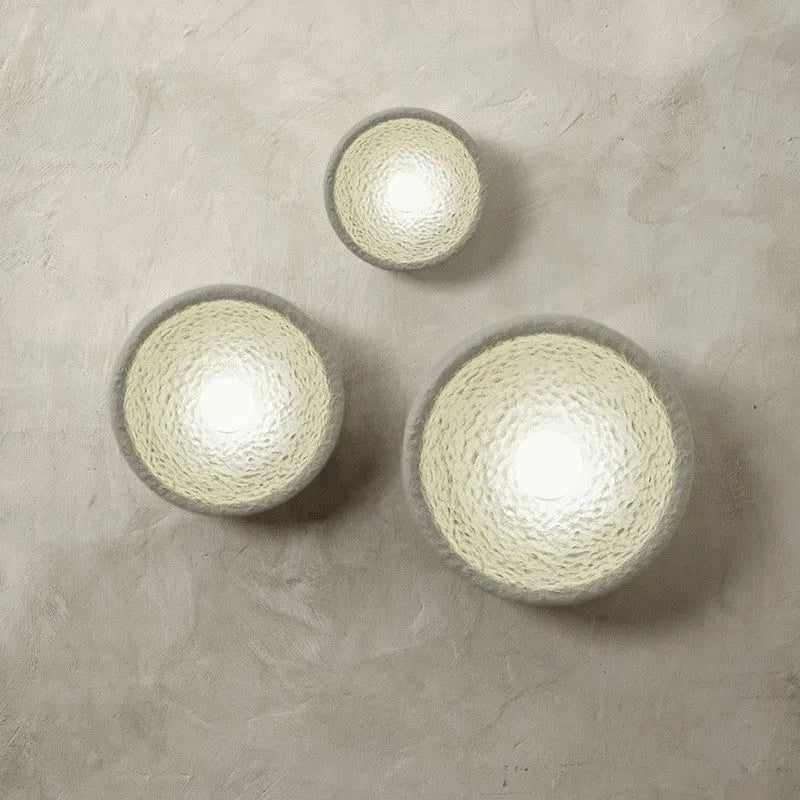 Japanese minimalist wall lamp with resin shade in three size options for ambient lighting