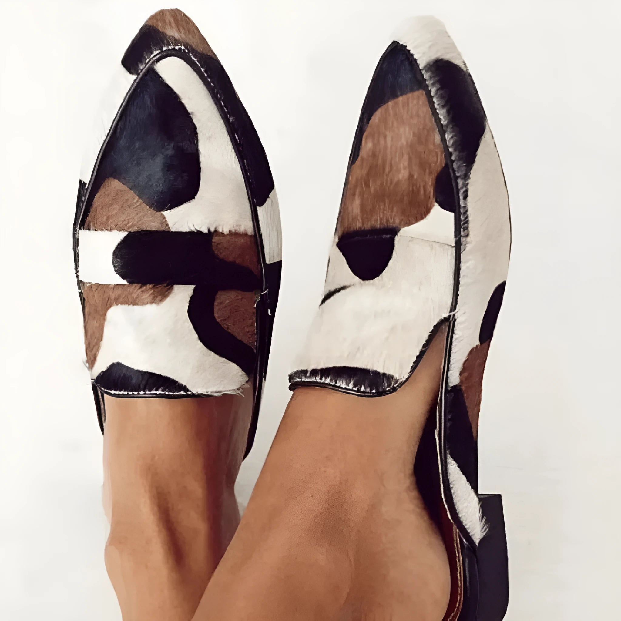 Women's black and white apricot retro pointed-toe shoes with imitation horse hair detailing on suede upper
