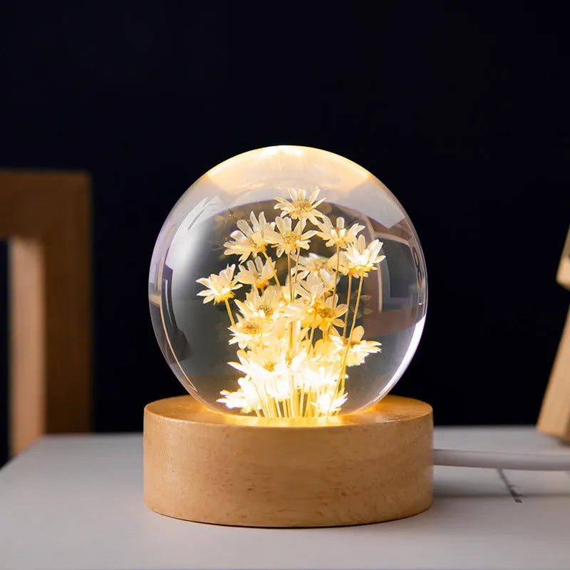 Dandelion preserved flower inside clear resin crystal ball on beech wood stand, functioning as a USB night light.