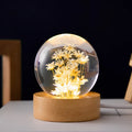 Dandelion preserved flower inside clear resin crystal ball on beech wood stand, functioning as a USB night light.