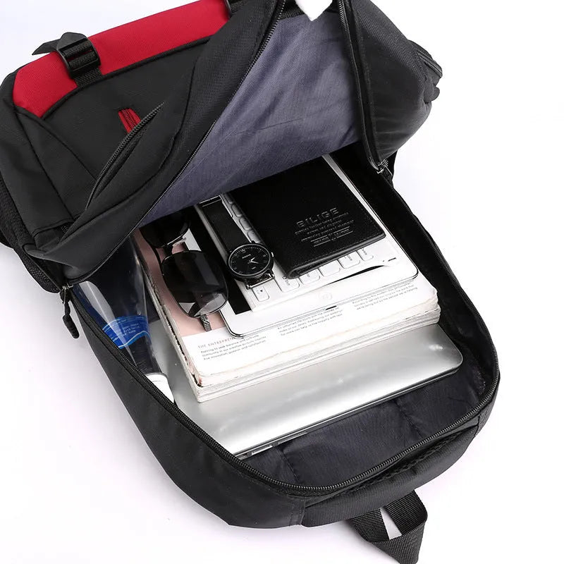 Black waterproof nylon school backpack with airpillow straps and contrast stitching detail.