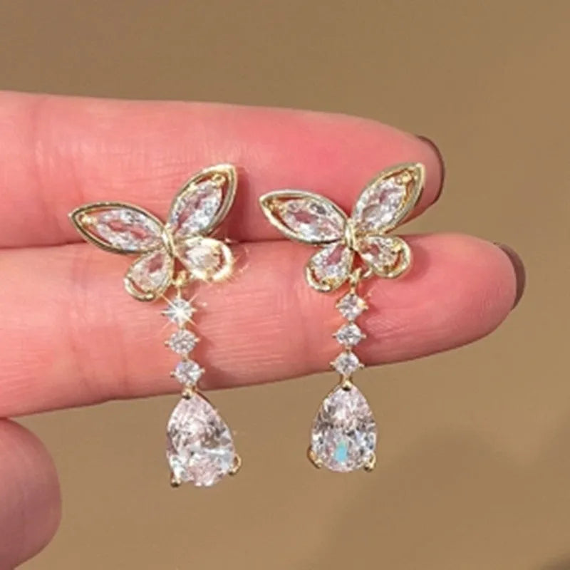 Women's bow stud earrings with electroplated platinum finish on zinc alloy